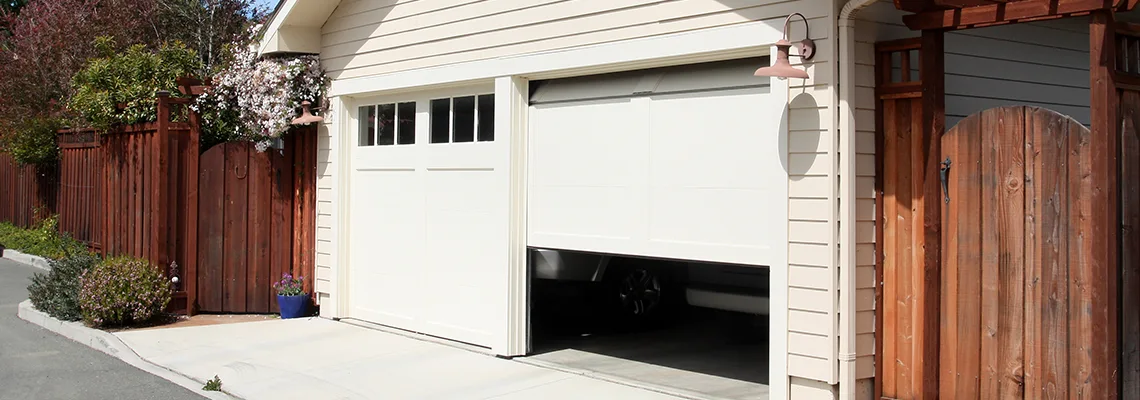 Fix Metal Garage Door Jerking in Plainfield, Illinois